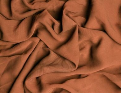 why do natural fiber clothes shrink even when washed correctly