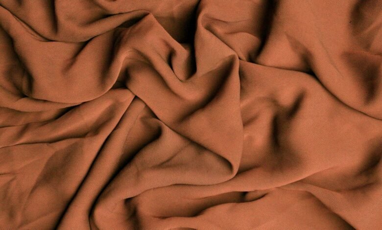 why do natural fiber clothes shrink even when washed correctly
