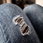 why do jeans tear at the crotch